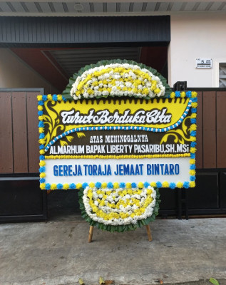 Papan Bunga Duka di Kosambironyok